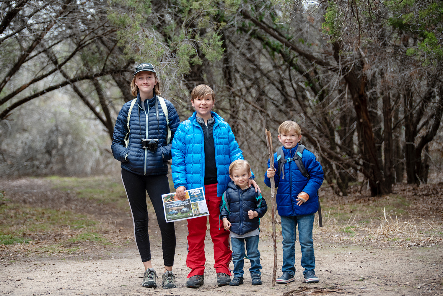 photo of all four kids hiking